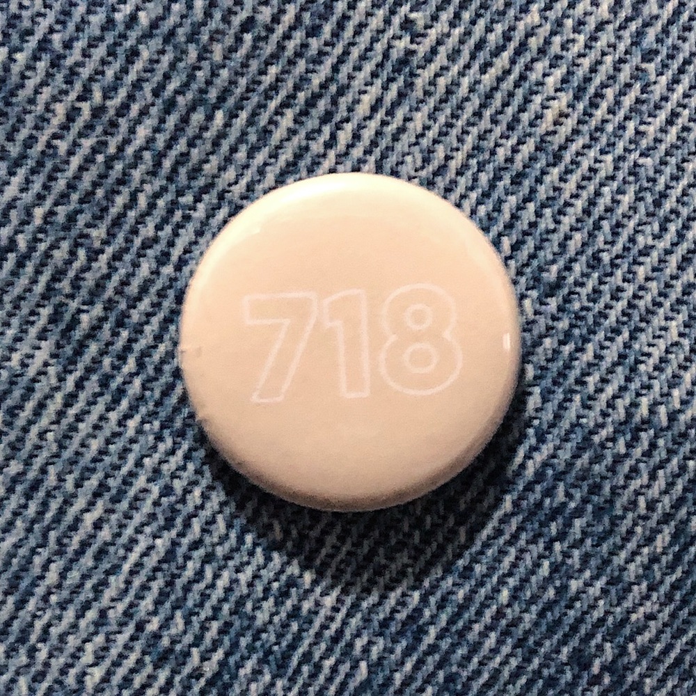 2/$10 718 - BROOKLYN HEAD BUTTON PIN